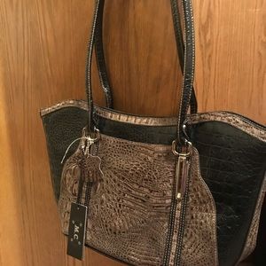 M.C. Leather bag-brand new